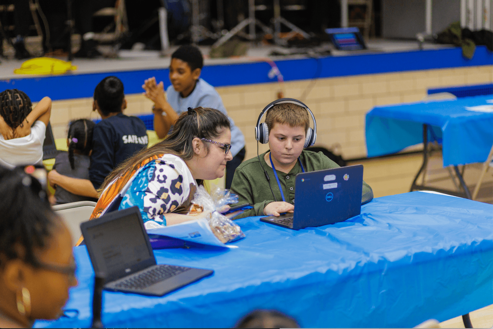 A student building a song in Conduction on a classroom laptop